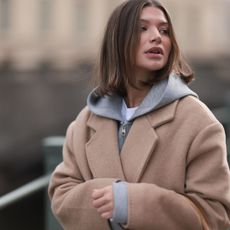 woman wearing one of the best women's gym hoodies