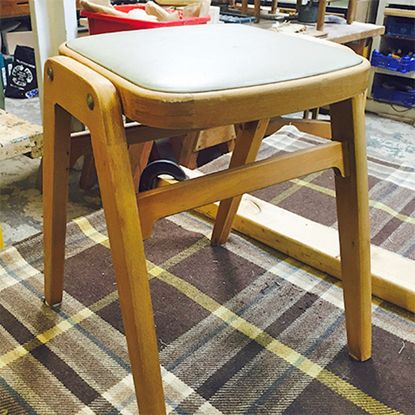 room with upcycled wooden stool and floor rug
