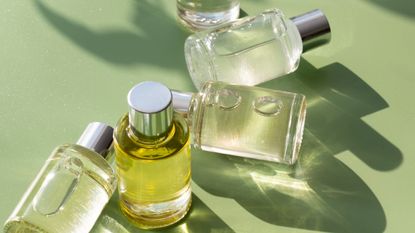 perfume bottles on a green background