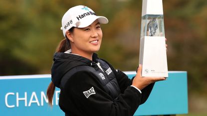 Minjee Lee poses for a photo with the BMW Ladies Championship trophy