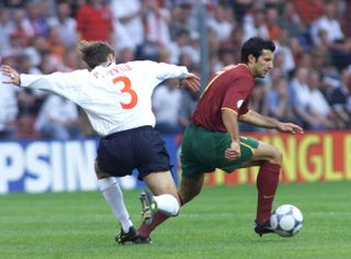 Luis Figo on the ball for Portugal against England at Euro 2000.