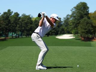 Keegan Bradley hitting a shot at Augusta National