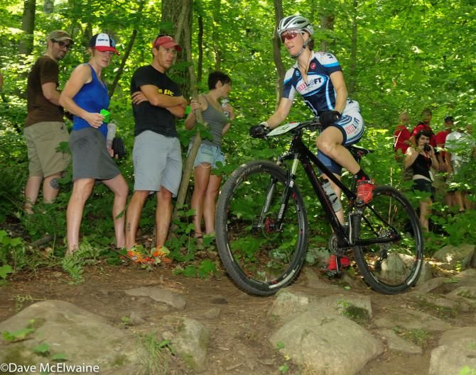 Maureen Bruno-Roy (Cycle Loft) riding one of the rocky off-camber sections of the descent.