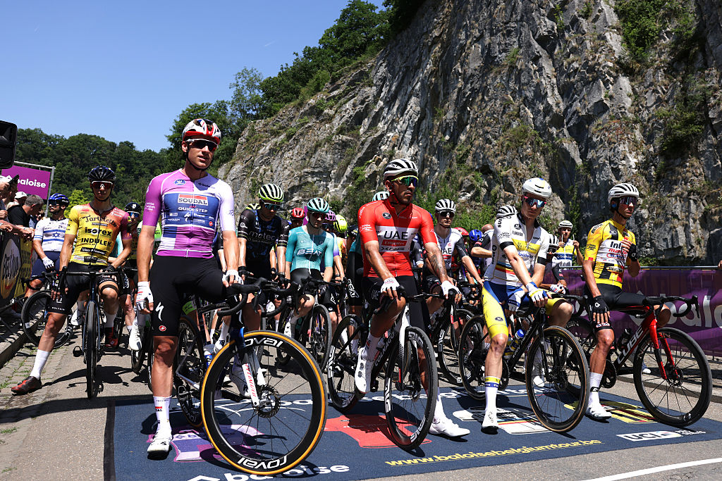 DURBUY, BELGIUM - JUNE 21: (L-R) Ethan Hayter of Great Britain and Team Soudal Quick-Step - Blue Leader Jersey, Juan Sebastian Molano of Colombia and UAE Team Emirates - XRG - Red Points Jersey, Alex Colman of Belgium and Team Flanders - Baloise - White Most Combative Rider Jersey and Huub Artz of Netherlands and Team Intermarche - Wanty - Yellow Best Young Rider Jersey prior to the 94th Baloise Belgium Tour 2025, Stage 4 a 173km stage from Durbuy to Durbuy on June 21, 2025 in Durbuy, Belgium. (Photo by Rhode Van Elsen/Getty Images)