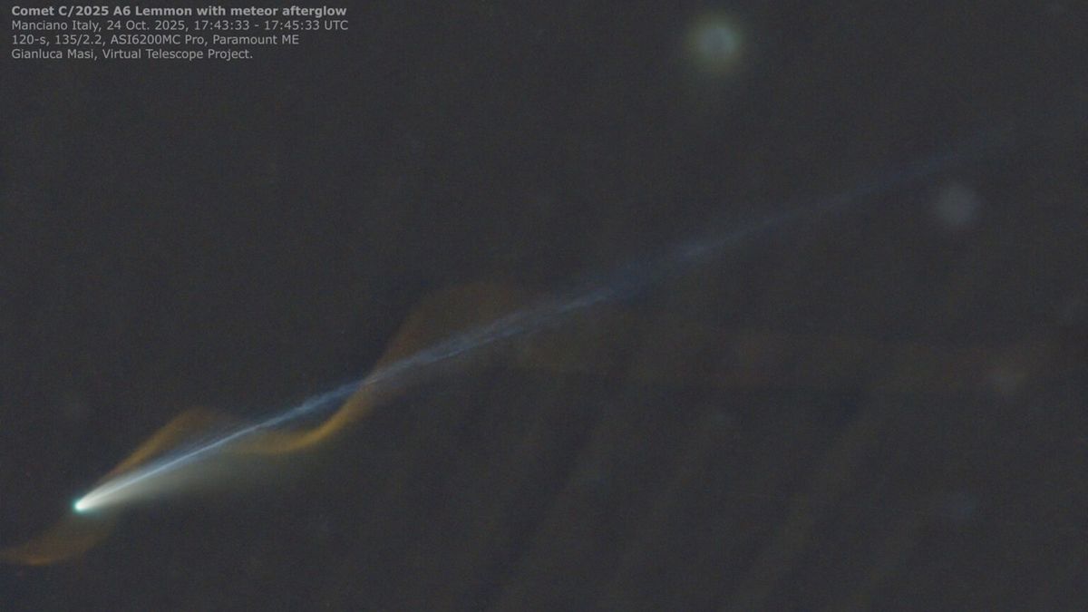 Miracle' photo captures Comet Lemmon and meteor seemingly entwined