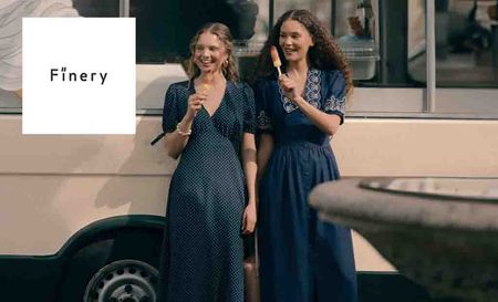 Finery logo placed over two women in navy maxi dresses with ice lollies
