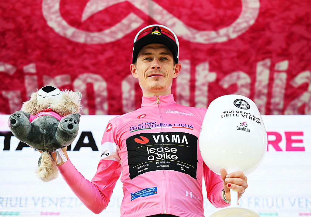 CARI, SWITZERLAND - MAY 26: Jonas Vingegaard of Denmark and Team Visma | Lease a Bike celebrates at podium as Pink Leader Jersey winner during the 109th Giro d&amp;amp;apos;Italia 2026, Stage 16 a 113km stage from Bellinzona to Cari 1645m / #UCIWT / on May 26, 2026 in Cari, Switzerland. (Photo by Dario Belingheri/Getty Images)