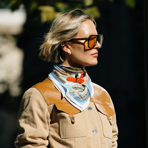 Woman wearing a silk scarf in Paris