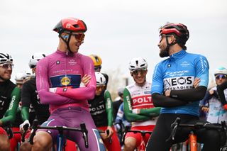 Jonathan Milan (left) and Filippo Ganna (right) line up for the start of stage three of Tirreno-Adriatico 2025