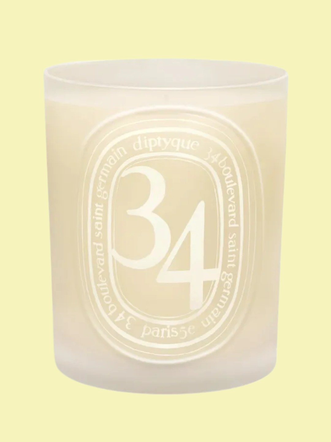 A white frosted glass candle from Diptyque