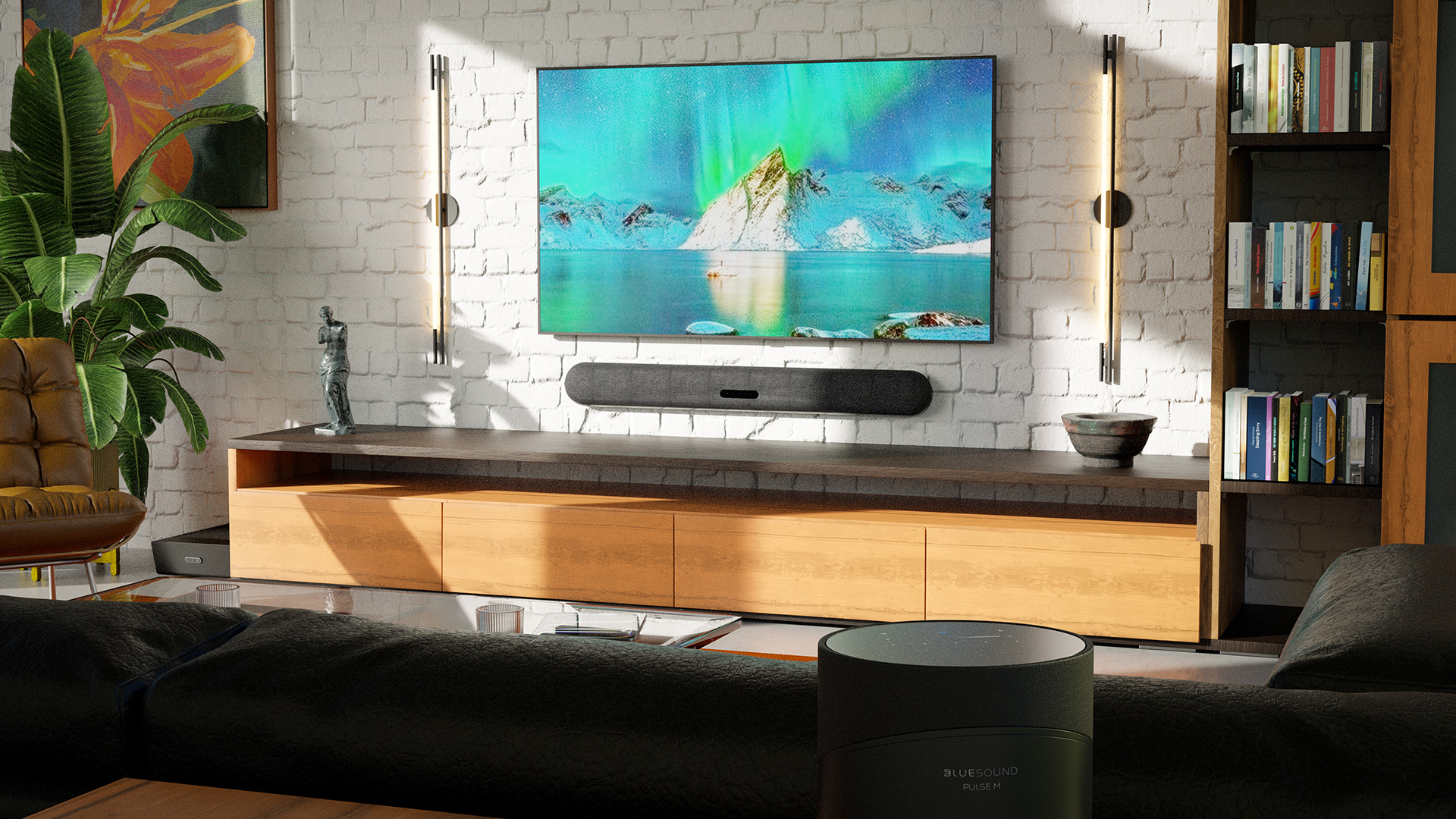 Promotional images showing Bluesound's Pulse home cinema in action