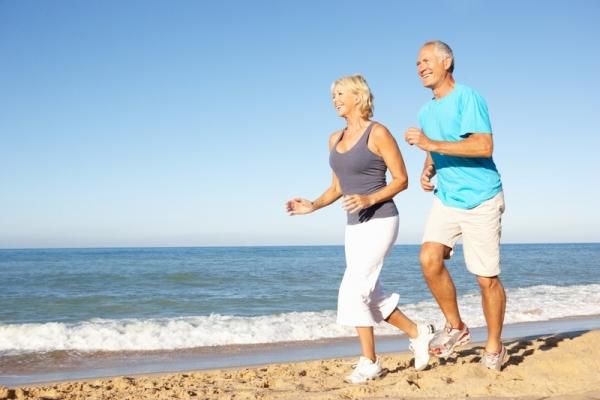 elderly couple jogging 