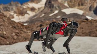 A prototype of the four-legged robot Spirit training in the mountains
