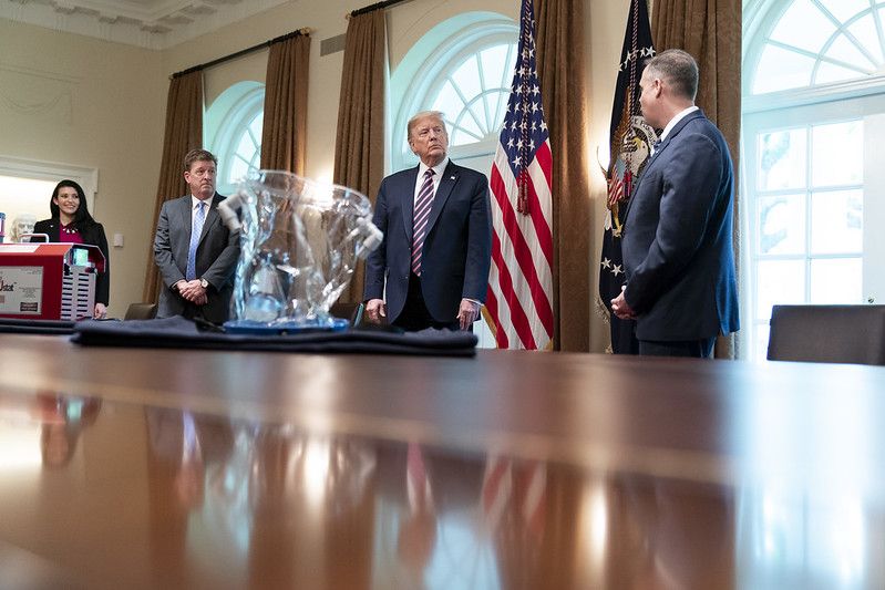 NASA Administrator Jim Bridenstine (right) shows President Donald Trump technology the agency has developed to fight the coronavirus pandemic, including a sterilization device and an oxygen hood, on April 24, 2020.