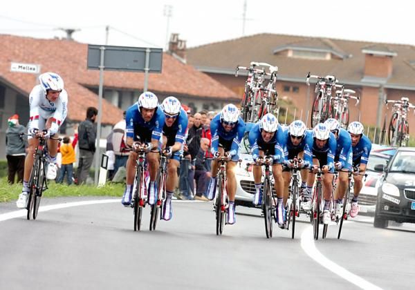 Branislau Samoilau, time trial champion of Belarus, finishes his pull at the front of the Quick Step formation.
