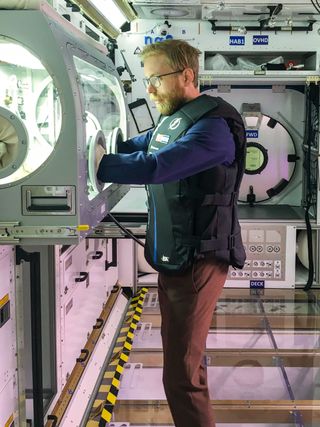 The AstroRad vest undergoes a fit test at NASA's Kennedy Space Center in Florida before launching to the space station.