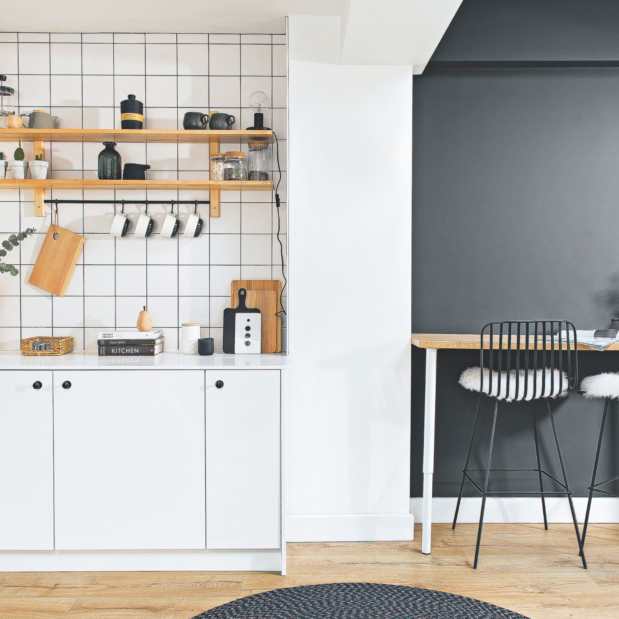 Open plan kitchen and dining space, zoned by colour
