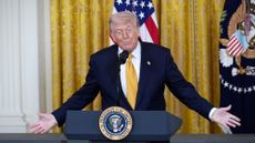 President Donald Trump talks to reporters amid Iran war talks