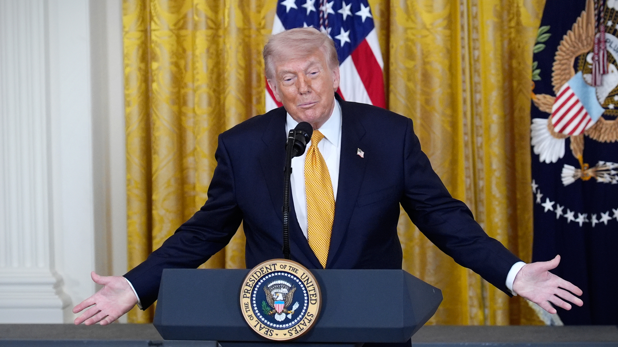 President Donald Trump talks to reporters amid Iran war talks