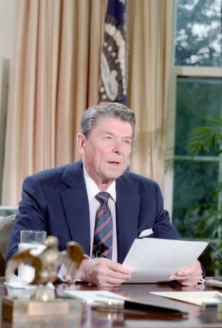 President Ronald Reagan addresses the nation after the loss of space shuttle Challenger and its STS-51L crew from inside the Oval Office at the White House, Jan. 28, 1986.