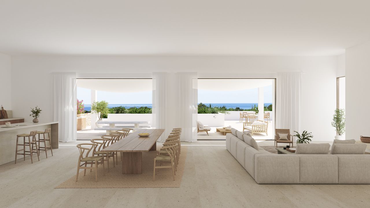 A minimalist living space in a neutral scheme, with views of the sea 