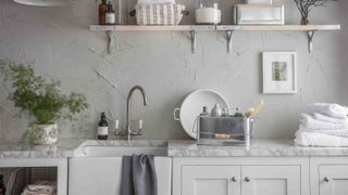 pale grey utility room with belfast sink