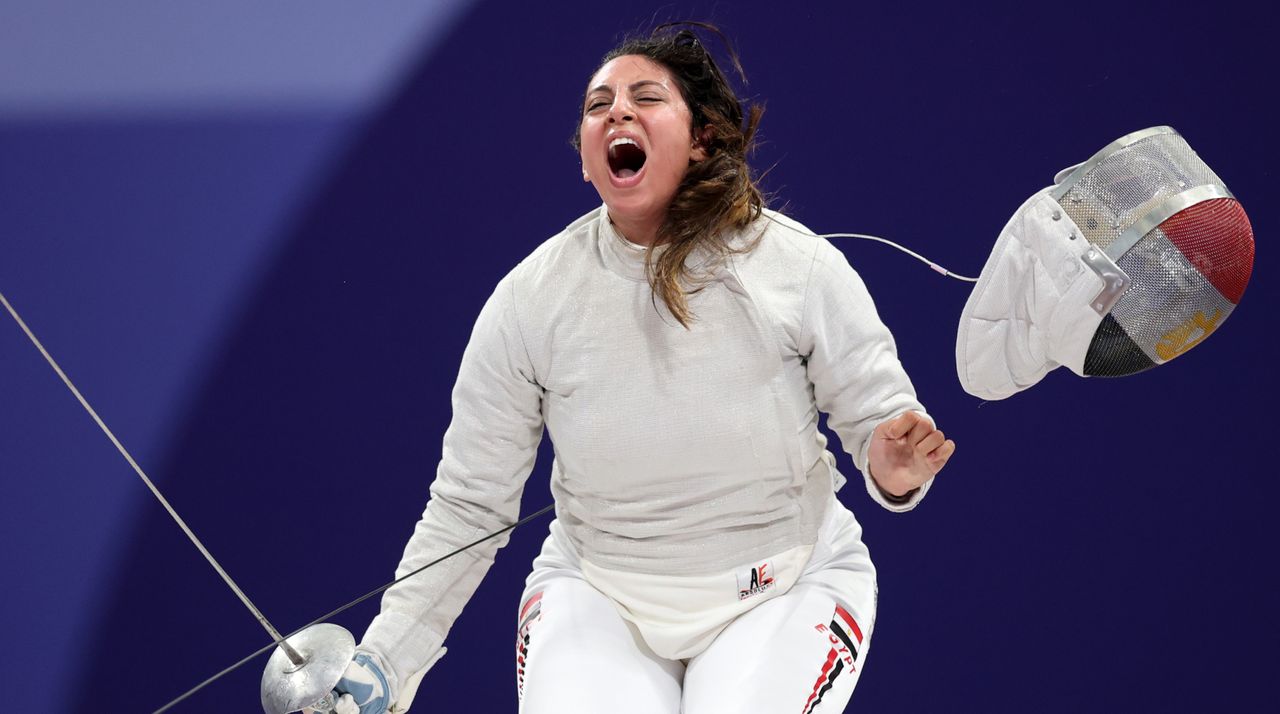 Nada Hafez of Team Egypt celebrates her victory against Elizabeth Tartakovsky of Team United States.