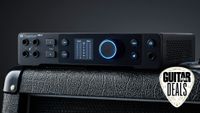A Presonus audio interface on top of a guitar cabinet