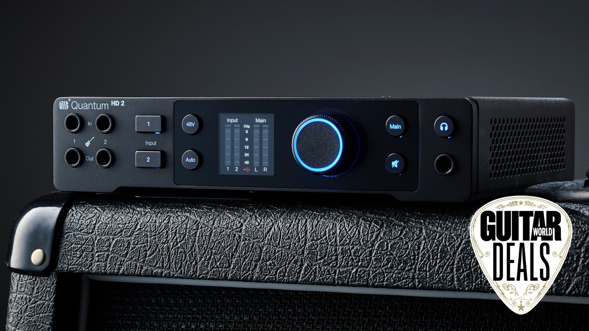 A Presonus audio interface on top of a guitar cabinet