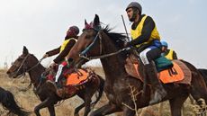 Afghan riders compete during the first edition of the Endurance Horse Riding competition on the outskirts of Kabul. 
