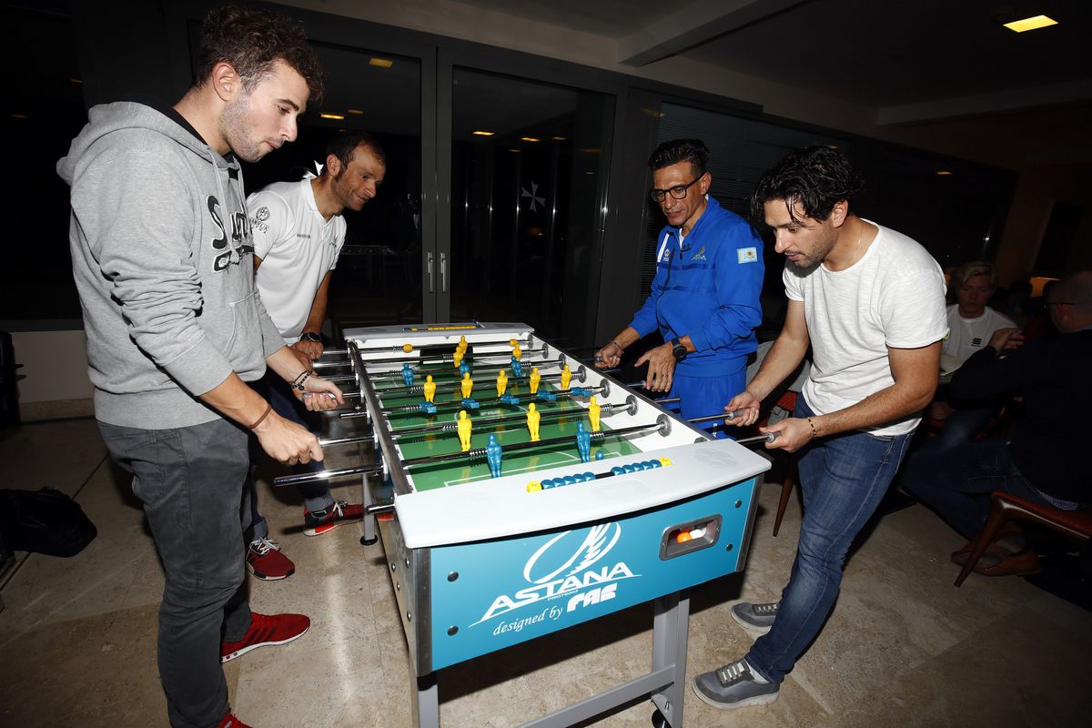 Riccardo Minali plays table football with his teammates