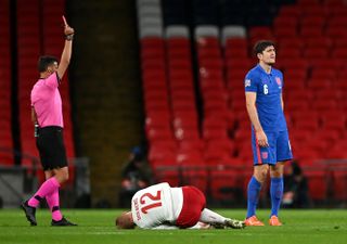 It was a forgettable night for Harry Maguire last time England played Denmark (Daniel Leal Olivas/PA)