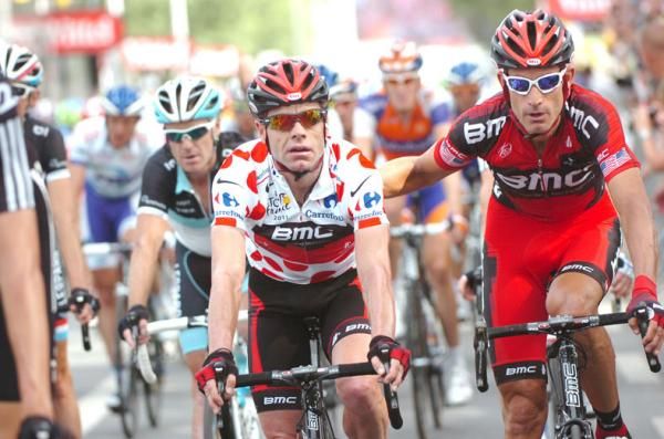 BMC's Cadel Evans and George Hincapie cross the line at the end of stage 3.