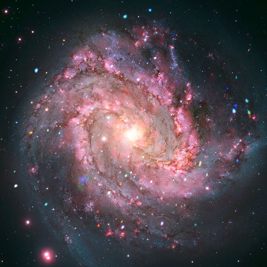 A composite shows the spiral galaxy M83