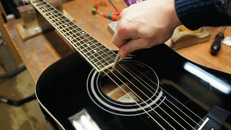 How to set acoustic guitar saddle height | MusicRadar