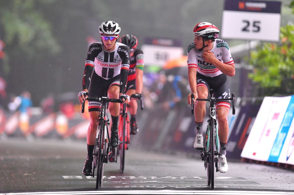 Jai Hindley and Gregor Muhlberger cross hte line