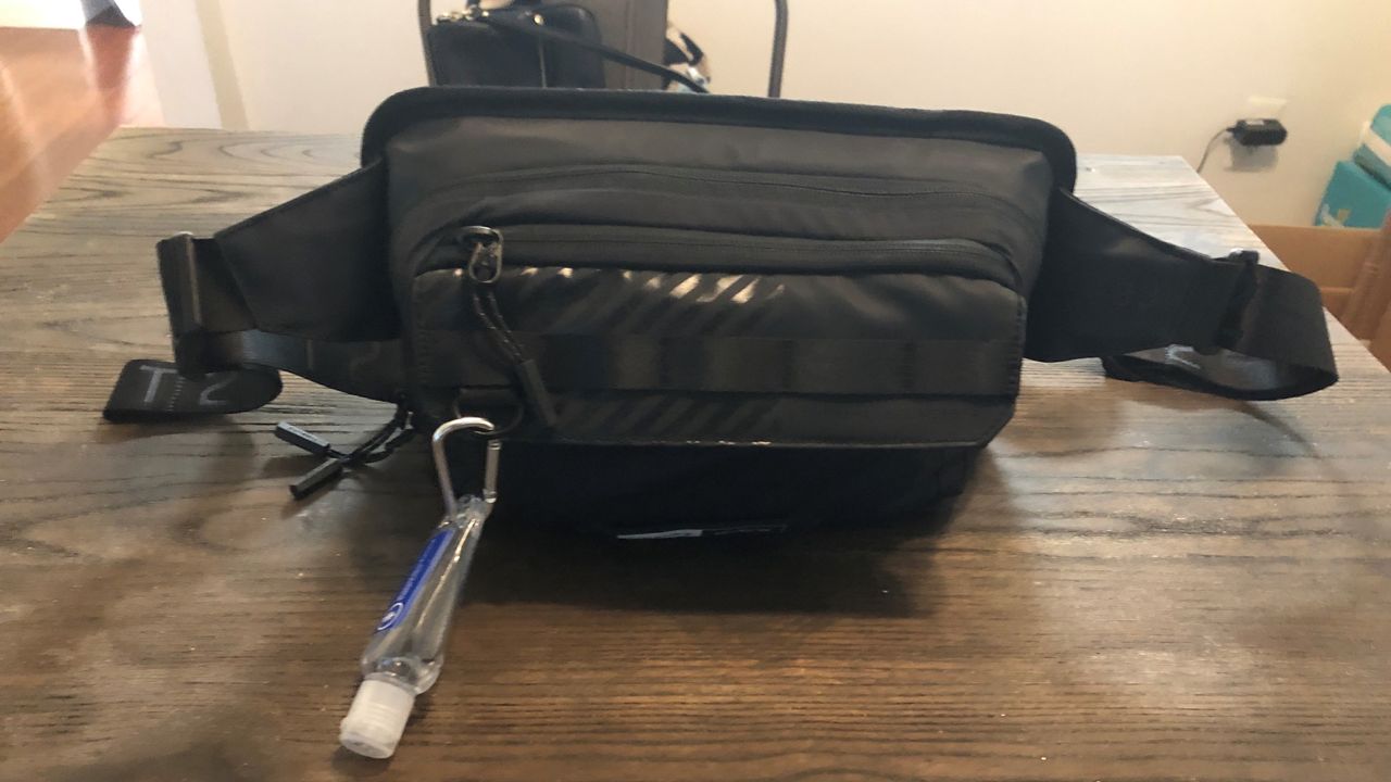 Astro cross body bag on table