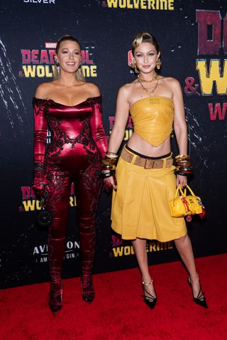 gigi hadid and blake lively attending the deadpool and wolverine premiere in themed outfits