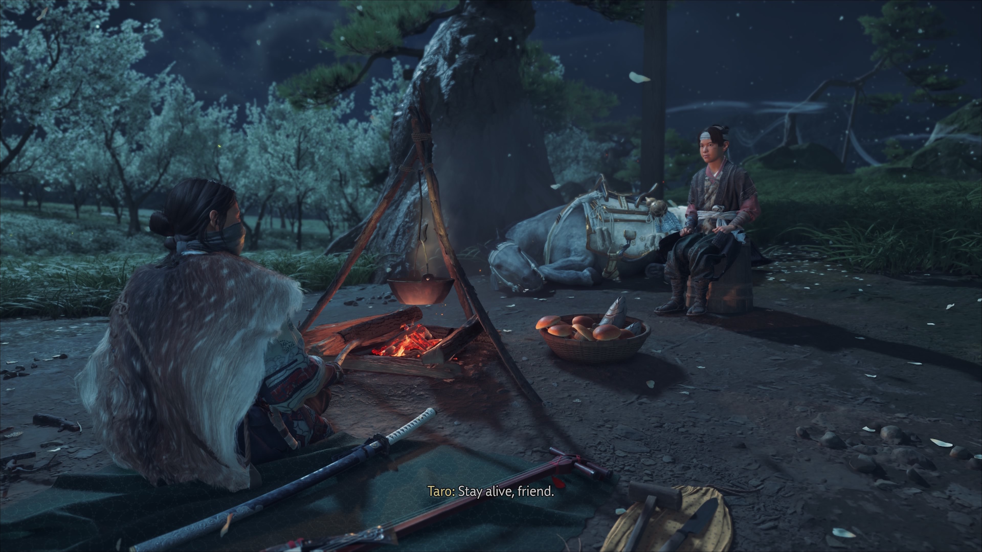 Ghost of Yotei screenshot with Atsu and Taro at a campfire