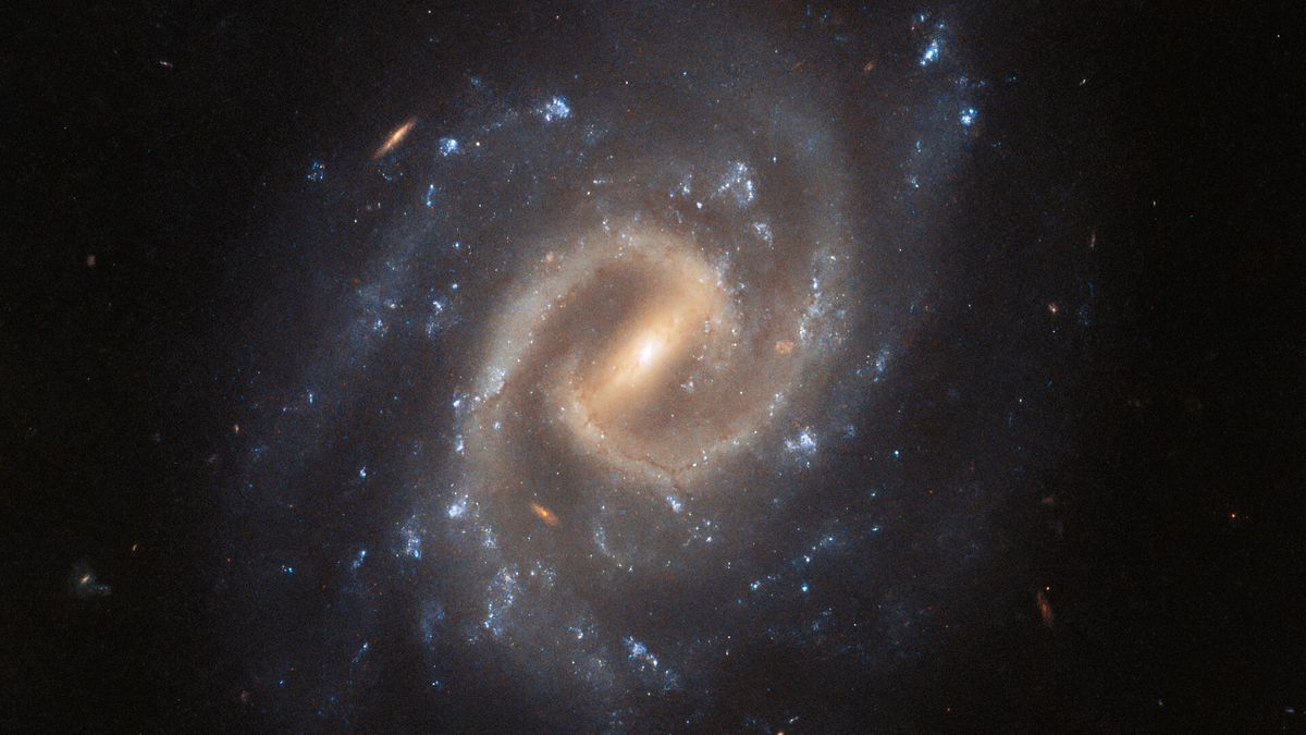 Hubble Telescope Spots A Bright Spiral Galaxy With A Violent Past | Space