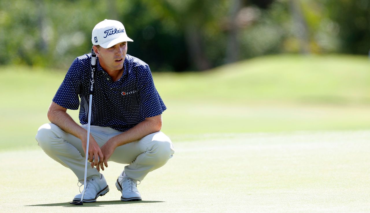 Ryan Gerard lines up a putt