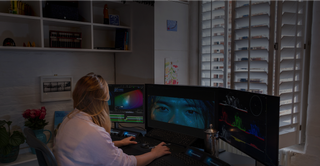 Woman working on color grading