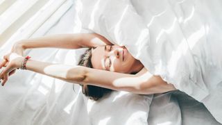 A woman relaxing in bed