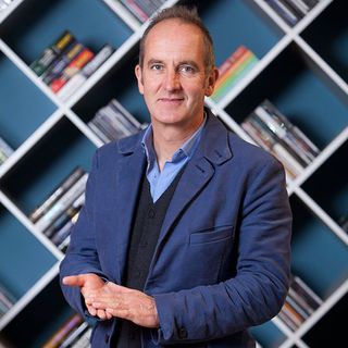 kevin mccloud in blue outfit