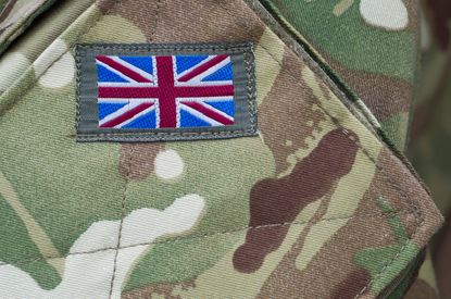 British Army camouflage uniform with the Union Jack flag sewn on the pocket.