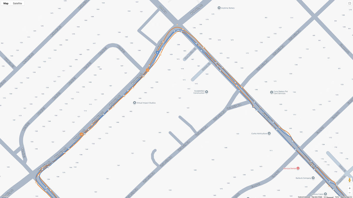 A GPS map showing how the Garmin Forerunner 970 (blue line) and Google Pixel Watch 4 (orange line) compare for a half-marathon test.