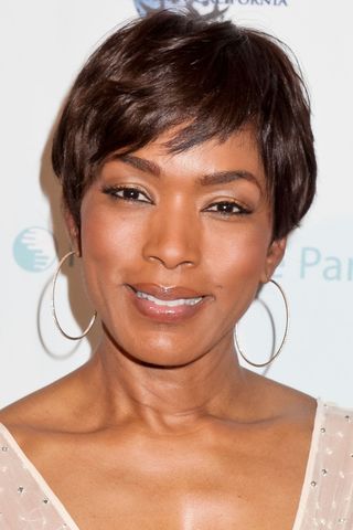 Angela Bassett has a layered pixie cut as she attends the 'Shall We Dance' annual gala for the coalition for at-risk youth at The Beverly Hilton Hotel on May 11, 2013 in Beverly Hills, California.