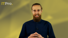 Presenter Ant Joblin on a yellow background talking to the camera