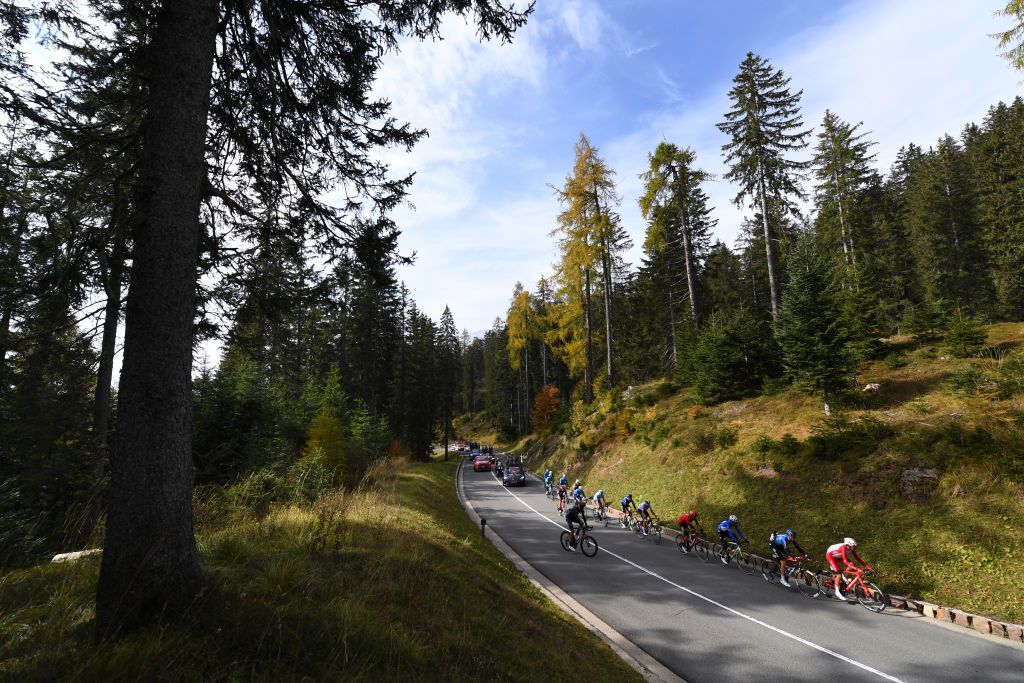 LAGHI DI CANCANO ITALY OCTOBER 22 Thomas De Gendt of Belgium and Team Lotto Soudal Ruben Guerreiro of Portugal and Team EF Pro Cycling Blue Mountain Jersey Ben Oconnor of Australia and NTT Pro Cycling Team Stephane Rossetto of France and Team Cofidis Solutions Credits Hofmahdjoch PCastrin 1704m Breakaway Peloton Landscape Forest during the 103rd Giro dItalia 2020 Stage 18 a 207km stage from Pinzolo to Laghi di Cancano Parco Nazionale dello Stelvio 1945m girodiitalia Giro on October 22 2020 in Laghi di Cancano Italy Photo by Tim de WaeleGetty Images