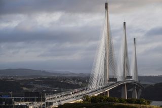 Morning traffic crosses the new Queensferry Crossing as it opens to traffic on August 30, 2017 in South Queensferry, Scotland. Scotland's newest road bridge which began construction in 2011, crosses the Firth of Forth near Edinburgh. The crossing is the world's longest three tower cable stayed bridge. (Photo by Jeff J Mitchell/Getty Images)